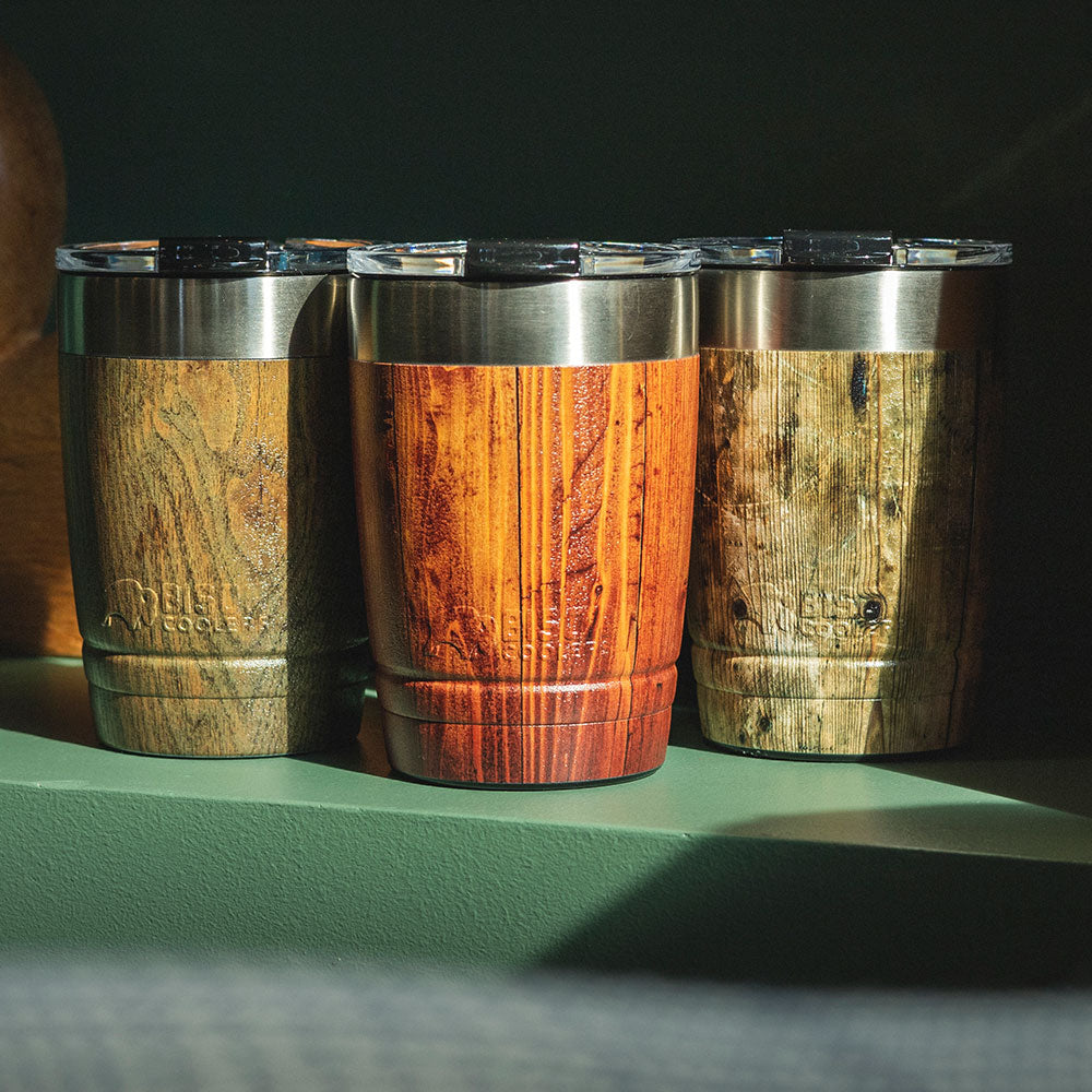 https://www.bisoncoolers.com/cdn/shop/products/Lifestyle-three-wood_1200x.jpg?v=1681857311